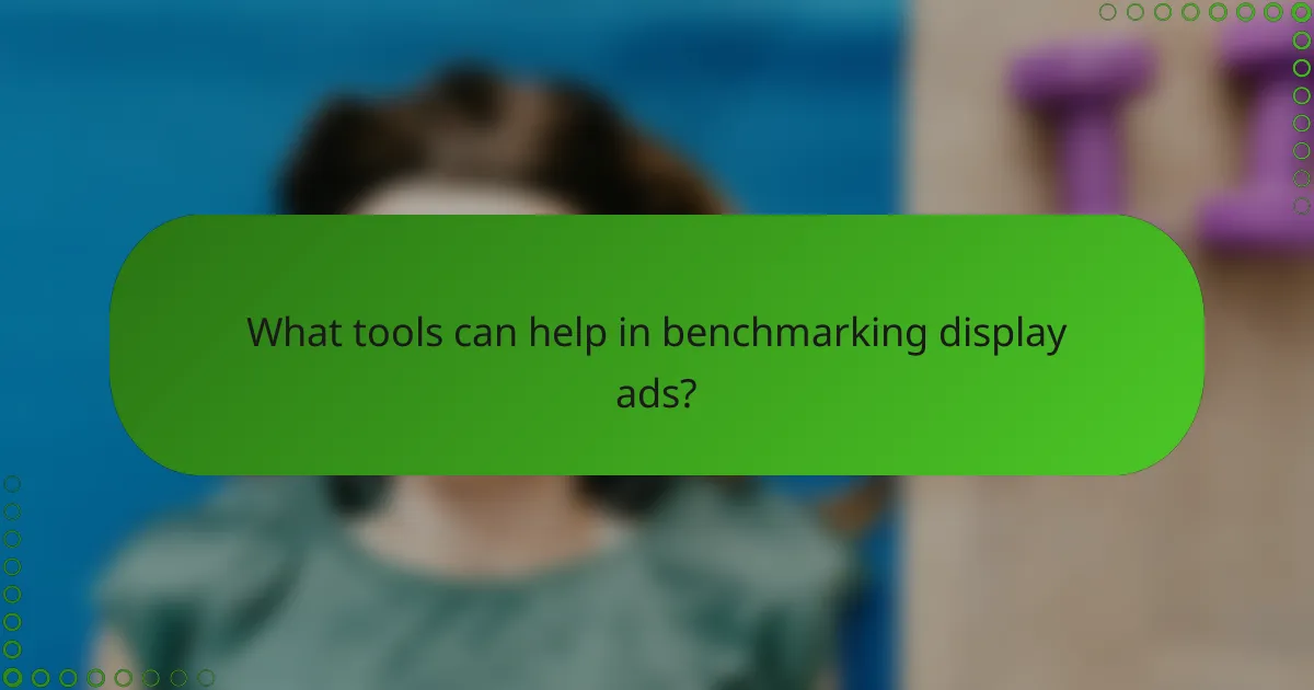 What tools can help in benchmarking display ads?